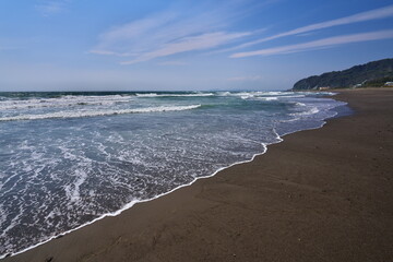 波に洗われる夏