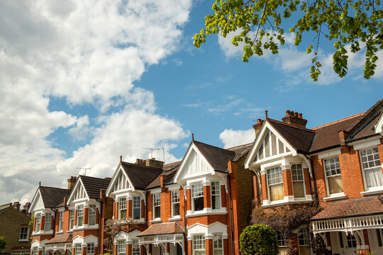 Row of typical upmarket British red brick period houses in west London