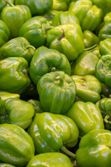 Obraz na płótnie Canvas fresh bell pepper at the market. bell pepper in bulk. ripe bell pepper in a street market
