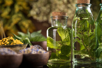 Oil, Natural remedy, healing herbs background