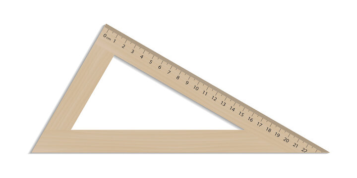 Ruler triangle on a wooden design.