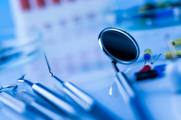 Dentist equipment on blue background