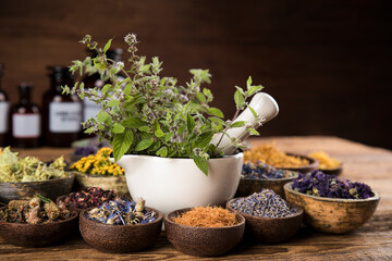 Natural medicine, wooden table background