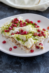 Gullac dessert on dark background. The traditional Ramadan dessert gullac. Milk dessert.