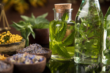 Oil, Natural remedy, healing herbs background