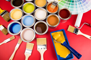 Colorful paint cans with paintbrush - 434051109
