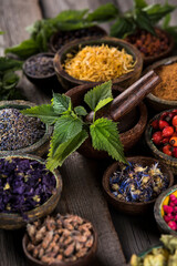 Herbs medicine and vintage wooden background