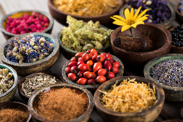 Herbs medicine and vintage wooden background