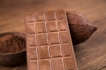 Chocolate bar, candy sweet, cacao beans and powder