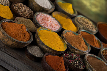 Colorful spices in bowl background