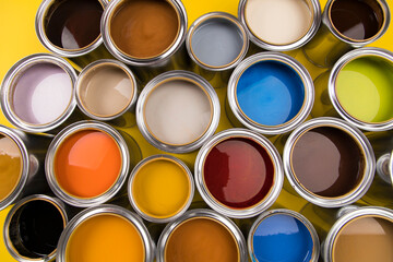 Full Buckets of rainbow colored oil paint