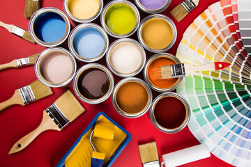 Paint can with a paintbrush