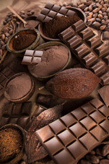 Chocolate sweet, cocoa pod and food dessert background