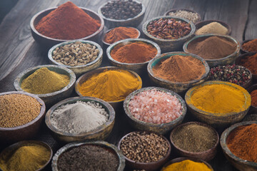 Colorful spices in bowl background