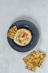 Hummus made from chickpeas. Hummus with chips and lemon. Healthy food