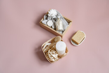 Spa composition with bath accessories arranged in boxes copy space.