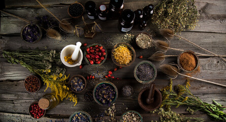 Fototapeta na wymiar Natural remedy, mortar and herbs