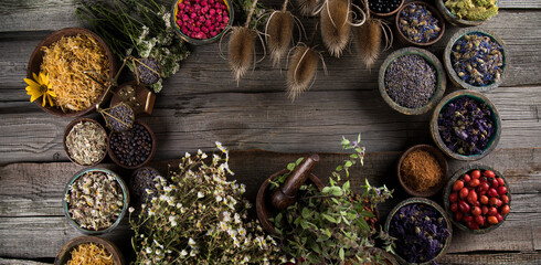 Natural remedy, mortar and herbs, space for your text