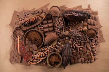 Aromatic cocoa and chocolate on natural paper background