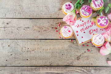 Happy moms day background with cupcakes