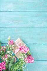 Beautiful spring flowers with gifts