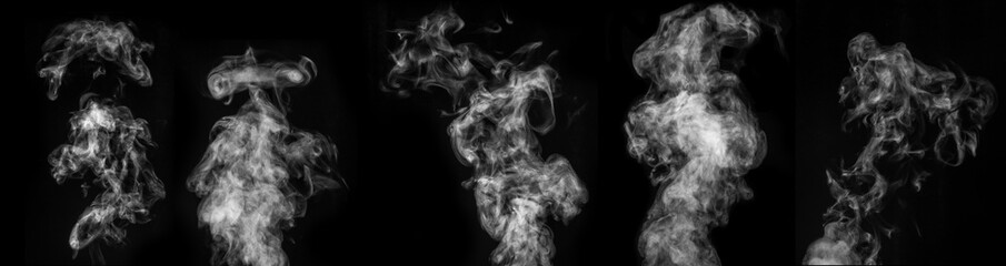 A perfect set of five different mystical curly white steam or smoke on a black background.