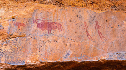Old rock painting in a granite rock wall of the San people in the Erongo mountains, Namibia