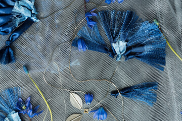Blue flower embroidery with fringe and blue scilla