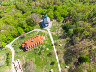 Fototapeta premium Skalka Baroque complex with church of St Mary Magdalene and Stations of the Cross. Mnisek pod Brdy, Czech Republic. Aerial view from drone.