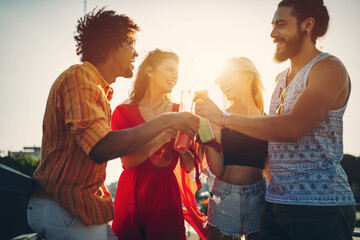 Happy young people attending festivals at summer having fun