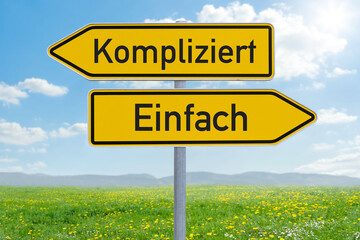 Two direction signs - Complicated or Easy - Einfach oder Kompliziert (german)