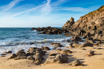 Fototapeta na wymiar Sandy beach among the rocks Houat island France