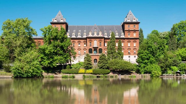 Turin, Italy. Zoom out Time Lapse Video of a view of the Valentino Castle in the park of the same name on the bank of the Po river.
