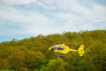 Hungary 2021: Hungarian medical helicopter landing countryside village