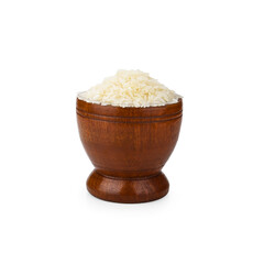 Rice in wooden mortar on white background.