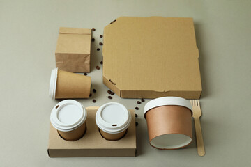 Delivery containers for takeaway food on gray background