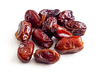 Dried dates with brown skin, on a white background