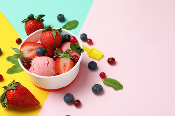 Fruit ice cream and ingredients on color background