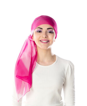 Young brunette woman wearing pink head scarf