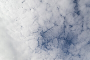 Beautiful clouds in the sky. The cumulus clouds are high in the air.