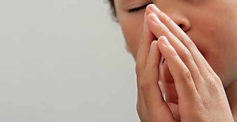 boy praying to God with hands together on white background stock photo  