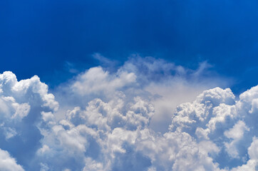 Fototapeta na wymiar The background of blue sky with clouds