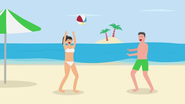 Young couple playing volley ball in the beach