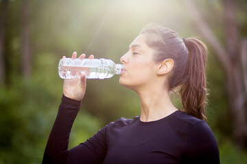 Fitness thirsty woman drink water