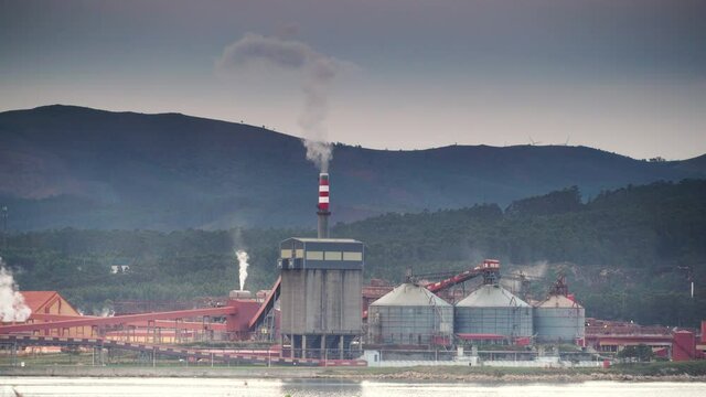 Industrial area on sea coast. Fabrica de Alumina Alcoa in Galicia Spain. Aluminum industry.