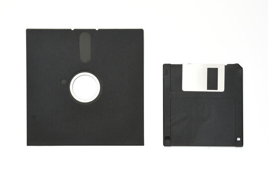 5.25 inch and 3.5 inch floppy diskettes isolated on white