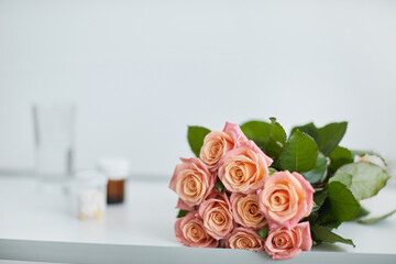 Close-up of beautiful bouquet lying on the table at hospital ward