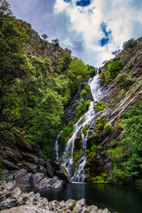 Naklejka na ściany i meble Landscape Of A Spectacular Waterfall In The Middle Of Nature Called: El Chorrituelo De Ovejuela. Located In Las Hurdes, North Of Cáceres-Spain. Nature