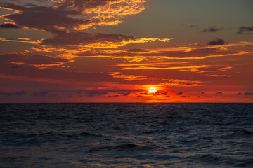 Amazing colorful sunrise in the open sea