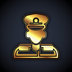 Gold Pilot icon isolated on black background. Vector